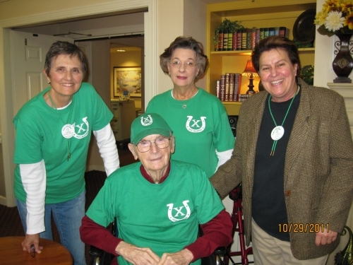 AHS Alumni members, Cathy Bontley Brown, Doris Whitlock, Ana Pettit present Mr. John Webb with an Alumni t-shirt & cap!